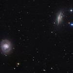 Spiral galaxies, M77 (face-on) and NGC 1055. Nasa image